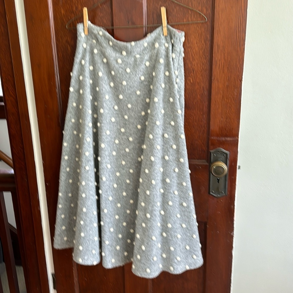 Fun and flirty wool/felted skirt with “snowballs” and contrasting liner